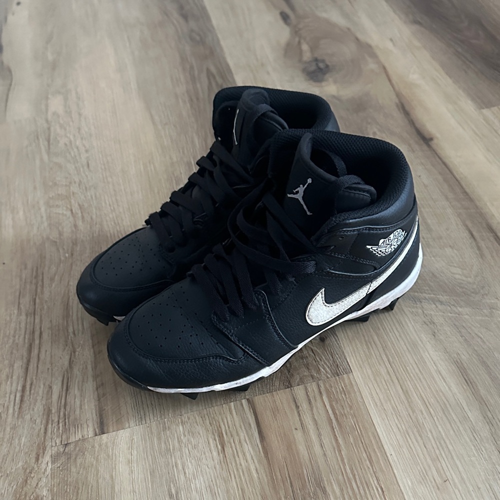 Black and White High-Top Cleats